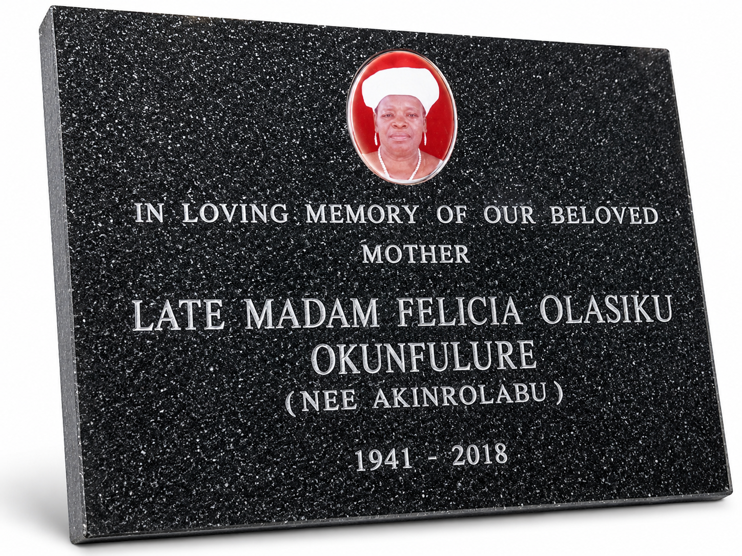 Premium marble and granite headstone engraving services in Abuja, Ado-Ekiti, Abeokuta, Akure, Osogbo and Ibadan, Nigeria.